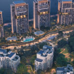 Aerial view of DISTRIKT at Ghaf Woods residential towers in green forest setting
