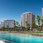 Aerial view of Bay Grove Residences 3 by Nakheel at Dubai Islands with beachfront and skyline