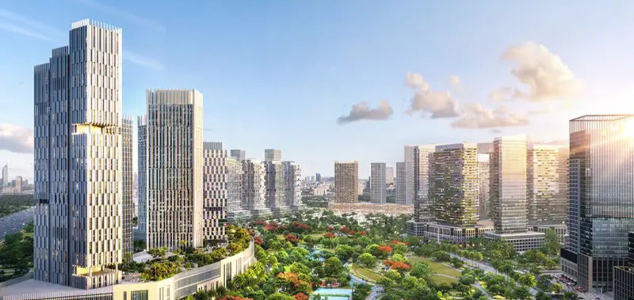 Azizi Milan residential tower in City of Arabia, Dubai with landscaped gardens and Italian-inspired design
