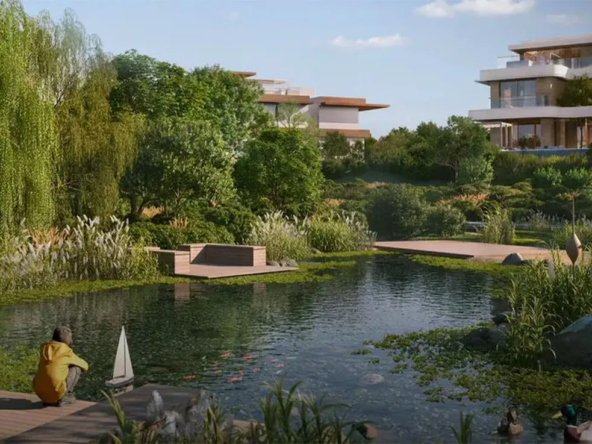 The Wilds Aldar luxury villas surrounded by landscaped lake and greenery in Dubailand