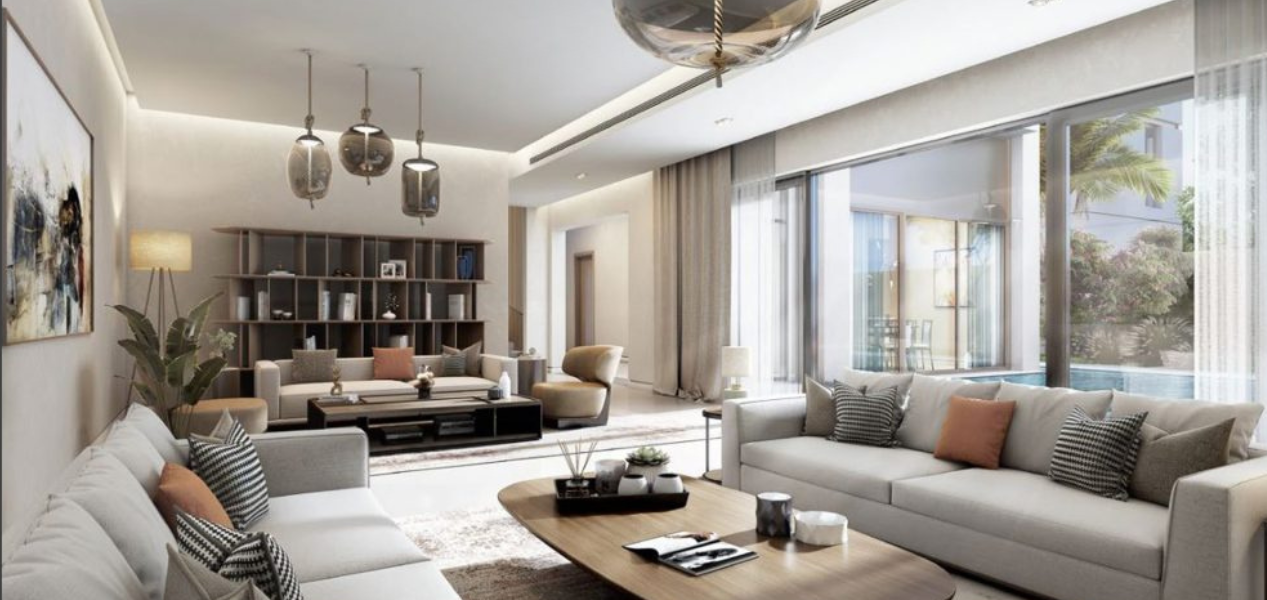 Spacious elegant sitting area with contemporary décor and natural light in Skyscape Aura Sobha Hartland villa.