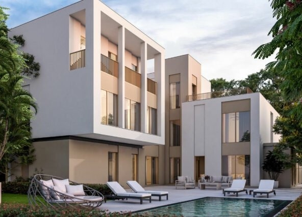Private backyard with swimming pool at Sobha Elwood Dubailand villas surrounded by greenery