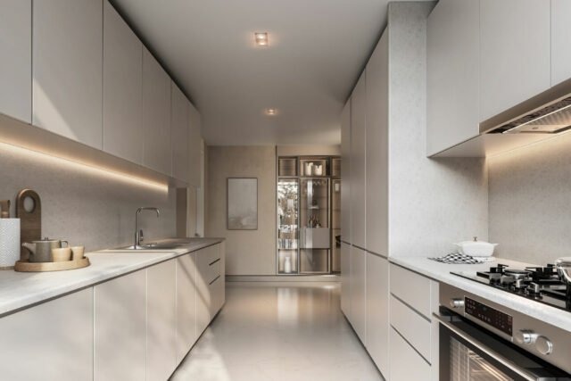 Modern kitchen design inside Sobha Elwood Dubailand villas with sleek cabinetry and lighting