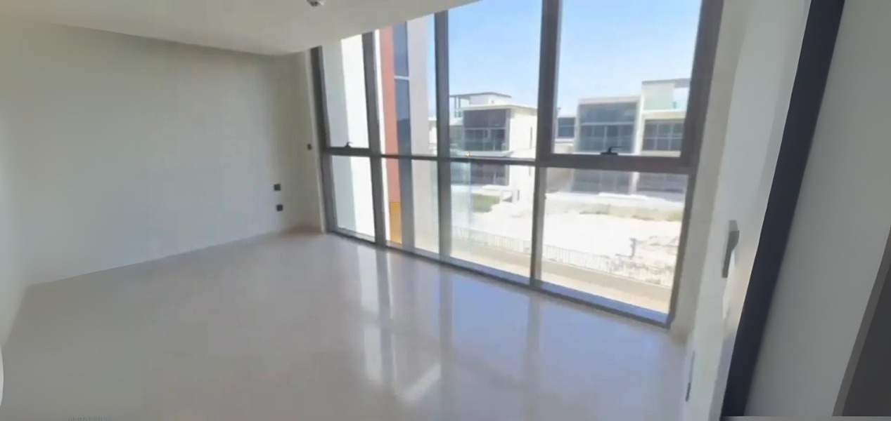 Spacious bedroom with large floor-to-ceiling windows in 5-Bed Villa Dubai Hills