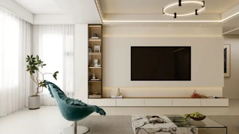 Elegant interior design at Sports View Residence Dubailand with TV wall and modern decor
