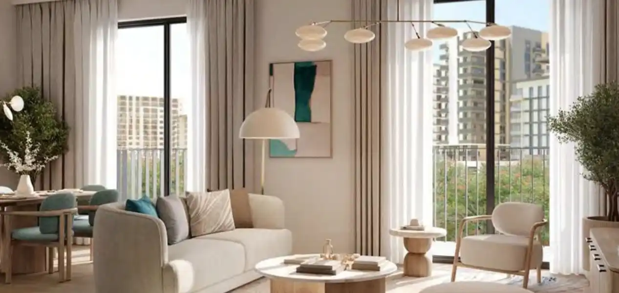 Modern living room interior at Rise By Athlon 4 Dubailand showcasing elegant design and natural light
