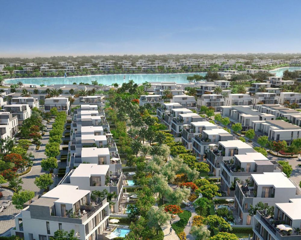 Properties in Tilal Al Ghaf featuring family-friendly homes and green spaces